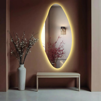 Фигурное асимметричное зеркало с эмбилайт подсветкой Кастин