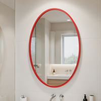 Овальное настенное зеркало в красной раме Каролина