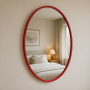 Овальное настенное зеркало в красной раме Каролина