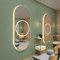 Зеркало-капсула в полный рост с фронтальной и задней декоративной подсветкой в тонкой золотой металлической раме Тренд 007