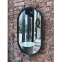 Овальное зеркало-капсула в черной металлической раме Оникс