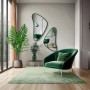 Настенное дизайнерское зеркало неправильной формы в зелёной раме Кадера